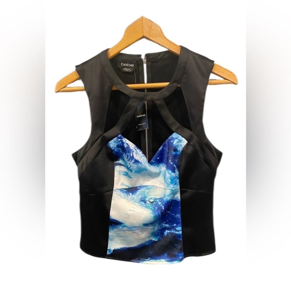 Brand new with tags BEBE crop top zipper on the back. Size M​